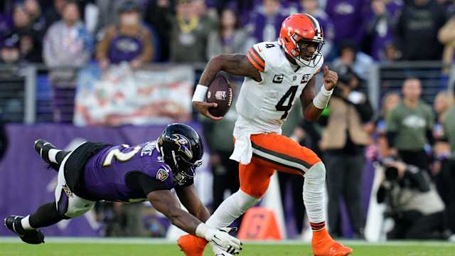 Nov 12, 2023; Baltimore, Maryland, USA; Cleveland Browns quarterback Deshaun Watson (4) runs with the ball as Baltimore Ravens defensive tackle Justin Madubuike (92) defends during the second half at M&T Bank Stadium. Mandatory Credit: Jessica Rapfogel-USA TODAY Sports